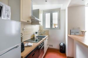 Photo de la galerie de l'établissement L'Arpajonnais 1 Cosy Hyper Centre 5min N20, à Arpajon