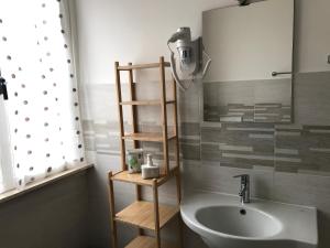 Ванная комната в ATTICO LIVORNO Bed & Relax