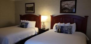 Ліжко або ліжка в номері Hotel Boulderado