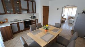 Kuchyň nebo kuchyňský kout v ubytování Apartments Stijak-Sorum