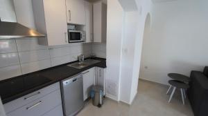 Kuchyň nebo kuchyňský kout v ubytování Apartments Stijak-Sorum