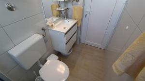 Koupelna v ubytování Apartments Stijak-Sorum + 37 fotografií
