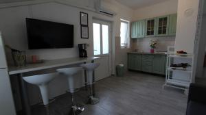 Kuchyň nebo kuchyňský kout v ubytování Apartments Stijak-Sorum