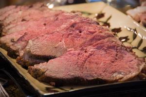 a piece of meat sitting on top of a plate at River's Bend Lodge in Cascade