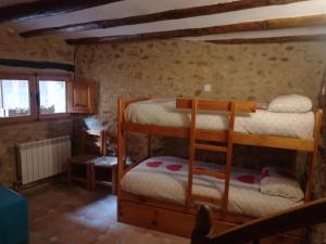 Katil dua tingkat atau katil-katil dua tingkat dalam bilik di Casa Rita