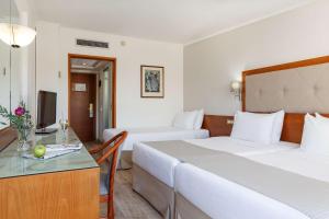Postel nebo postele na pokoji v ubytování Best Western Plus Hotel Plaza