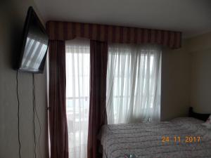Postel nebo postele na pokoji v ubytování DPTO. PRIMERA LINEA VISTA DIRECTA A LA COSTA
