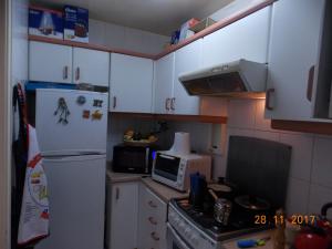 Kuchyň nebo kuchyňský kout v ubytování DPTO. PRIMERA LINEA VISTA DIRECTA A LA COSTA