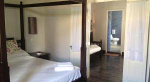 Letto o letti in una camera di Casa Colonial