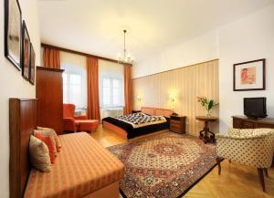 Ein Sitzbereich in der Unterkunft Hotel Konvice