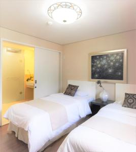 Tops10 Resort Donggang Cistar客房内的一张或多张床位