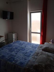 Postel nebo postele na pokoji v ubytování B&B Express