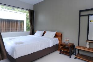 Letto o letti in una camera di Hau Eco Lodges Citumang Pangandaran
