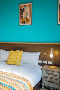 Postelja oz. postelje v sobi nastanitve Fun Trip - Fu May Sea View Holiday house l 無敵海景交誼廳 l 附汽機車租賃 l
