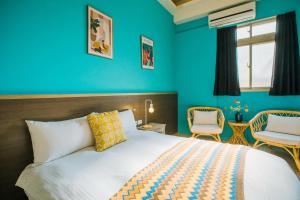 Postelja oz. postelje v sobi nastanitve Fun Trip - Fu May Sea View Holiday house l 無敵海景交誼廳 l 附汽機車租賃 l
