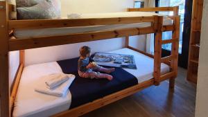 A bed or beds in a room at Schmiedhof