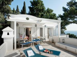 a villa with a view of the ocean at Villa Marina Little Beach in Capri