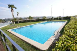 Bazén v ubytovaní 024 - Blue Dreams Penthouse Tabarca - comfortHOLIDAYS alebo v jeho blízkosti