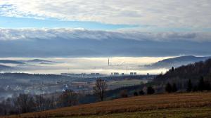 a view of a foggy field with a city in the background at Apartament Góra Szybowcowa in Jelenia Góra