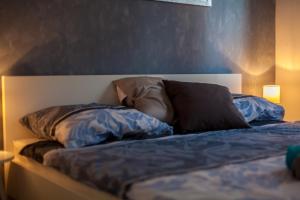 Postel nebo postele na pokoji v ubytování Apartments Didi