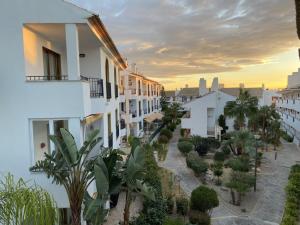 arial view of a city with buildings and trees at Alfaz del Sol in Alfaz del Pi