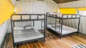 Letto o letti in una camera di Hau Eco Lodges Citumang Pangandaran