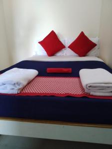 Postel nebo postele na pokoji v ubytování RAJE SAMBHAJI GUEST HOUSE