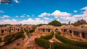 an aerial view of a building with hedges at Aliyah Eco-Lodge in Bawiti