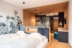 Postel nebo postele na pokoji v ubytování Marini's giardino Hotel