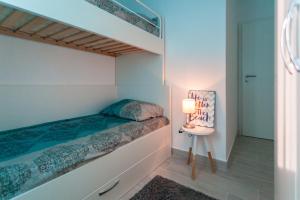 Postel nebo postele na pokoji v ubytování Apartments Didi