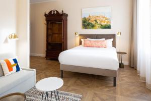Ένα ή περισσότερα κρεβάτια σε δωμάτιο στο Appart hôtel Maison Montgrand-Vieux Port