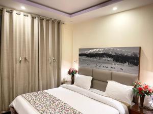 Voodi või voodid majutusasutuse Hotel Centre Point toas