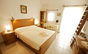 Postel nebo postele na pokoji v ubytování Villa Angelina Supetar + 37 fotografií