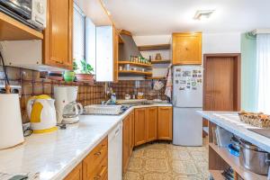 Kuchyň nebo kuchyňský kout v ubytování Apartments Biserka in Banjole