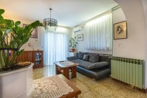 Posezení v ubytování Apartments Biserka in Banjole
