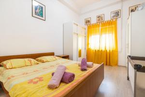 Postel nebo postele na pokoji v ubytování Apartments Biserka in Banjole + 32 fotografií