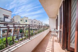 a balcony with a view of a street at Apartments Banko in Rovinj