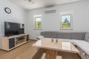 Μια τηλεόραση ή/και κέντρο ψυχαγωγίας στο Irma Apartment