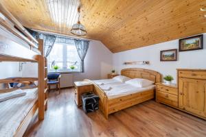 Postel nebo postele na pokoji v ubytování Orchidea