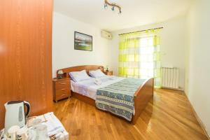 Postel nebo postele na pokoji v ubytování Rooms Glavan 63