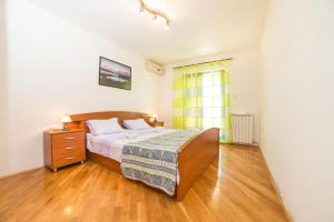 Postel nebo postele na pokoji v ubytování Rooms Glavan 63
