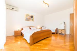 Postel nebo postele na pokoji v ubytování Rooms Glavan 63