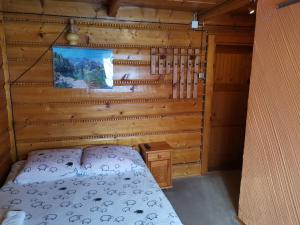Rúm í herbergi á Pod Zielonym Bykiem