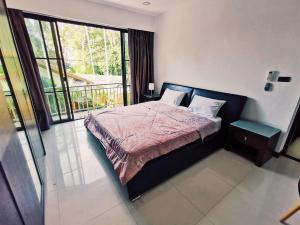 Postel nebo postele na pokoji v ubytování 4poolvillas