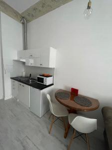 Kuchyňa alebo kuchynka v ubytovaní Apartament Victor20