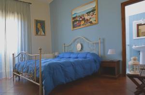 A bed or beds in a room at B&B Casa Degli Artisti