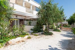 Vonkajšia záhrada v ubytovaní Appartamento Gardenia in Villa Mariella