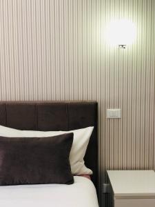 Postel nebo postele na pokoji v ubytování B&B Da Jana
