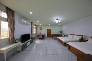 تلفاز و/أو أجهزة ترفيهية في Bridgeside Homestay