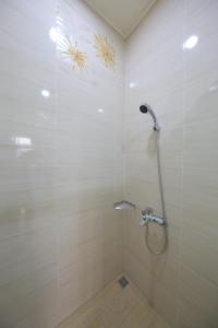 حمام في Bridgeside Homestay